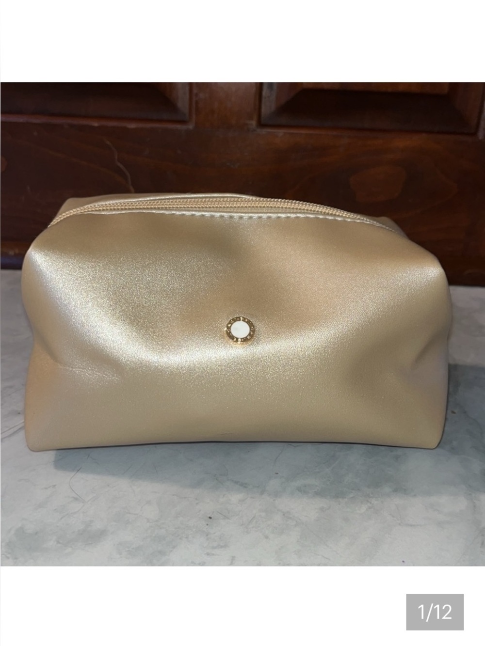 Bvlgari   Cosmetic pouch conjunction/ UAE Airlines  zippered metallic gold
NWOT